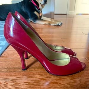 Beautiful bright red peep toe pumps